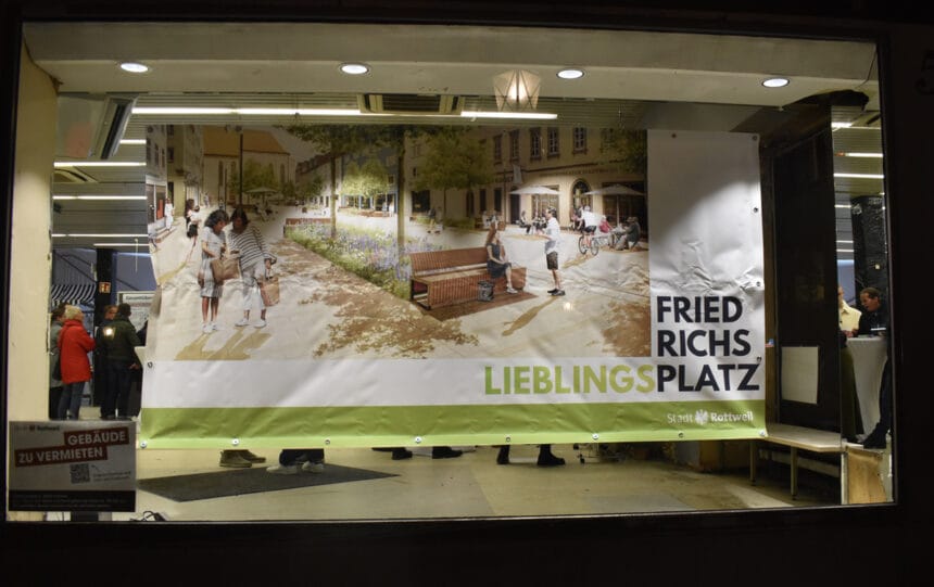 EIn großes Plakat im Schaufenster.