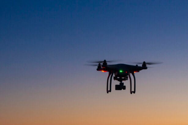 drone flying over ocean at dawn